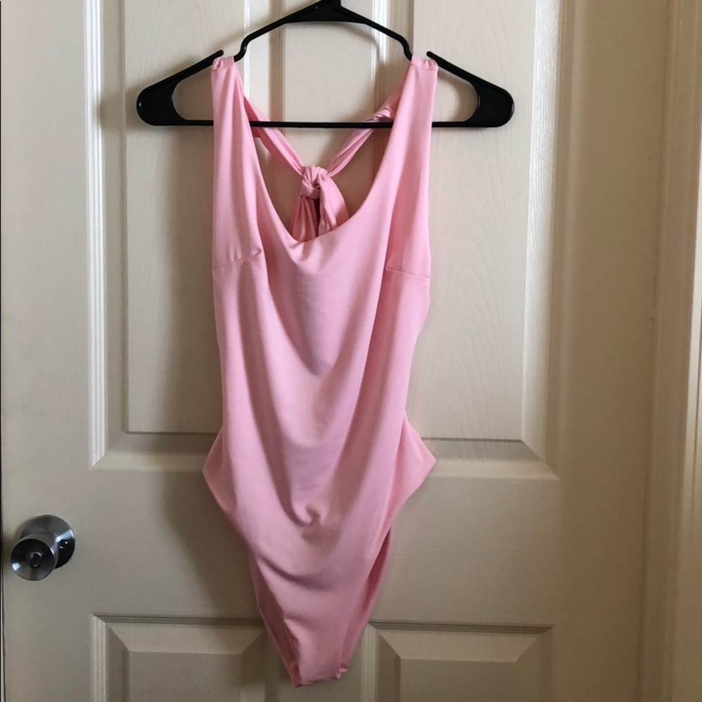 Light pink body suit